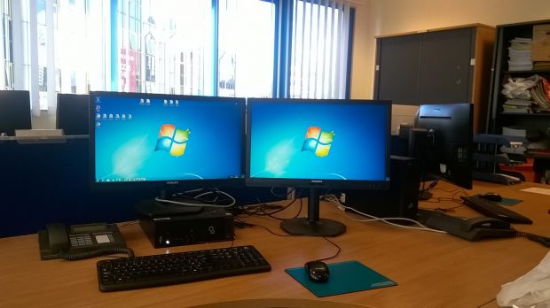 2 screens with a mouse and keyboard