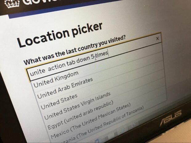 An image of the autocomplete in use. The text in the textbox reads “unite action tab down 5 times”. There are a set of seven country results below.