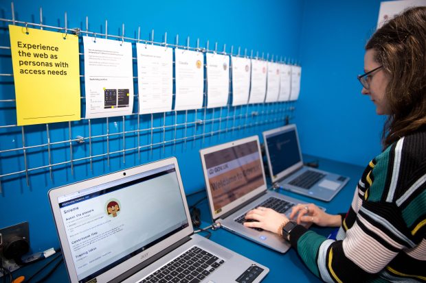 A woman using the Accessibility Empathy Lab at the Government Digital Service