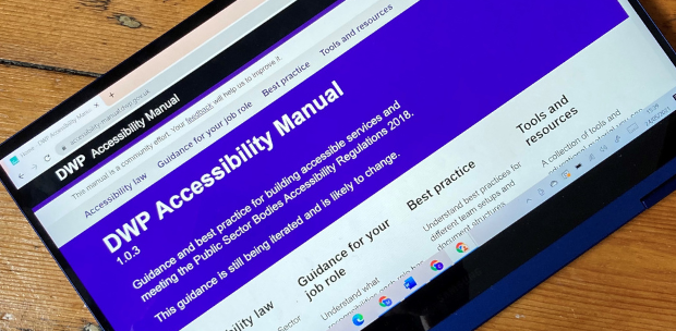 A tablet showing the DWP Accessibility Manual website